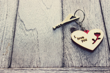 Key of Love,Heart Keychain on wood table