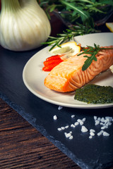 grilled Salmon with lemon, herbs and pesto