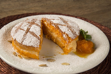 Delicious dessert of naked pumpkin cake on the plate