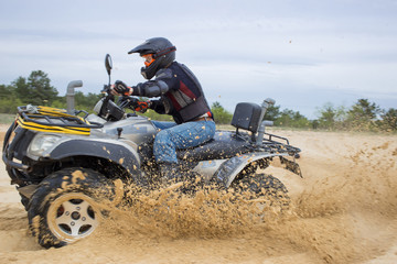 Fototapeta premium Racing ATV is sand.