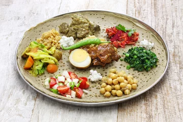 Zelfklevend Fotobehang ethiopian cuisine © uckyo