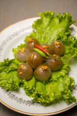 Stock Photo:
Thai Traditional Dessert, Tapioca balls with pork filling serve with vegetable