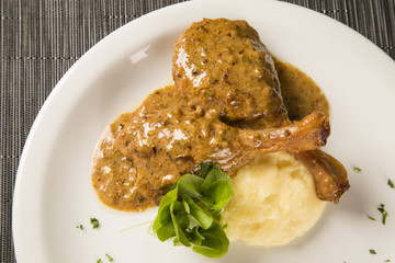 roast duck with mashed potato on the plate
