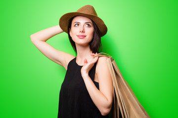 portrait of the young woman with shopping bags