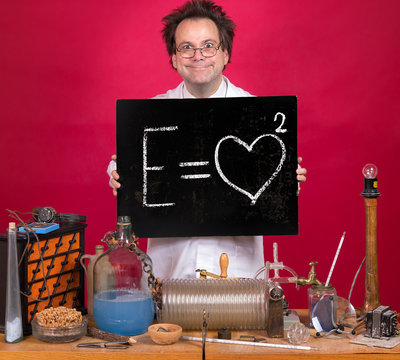 Professor in the laboratory shows a blackboard with mathematical formula