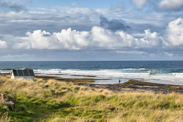 Fototapeta na wymiar The beach at Bamburgh in Northumberland in England
