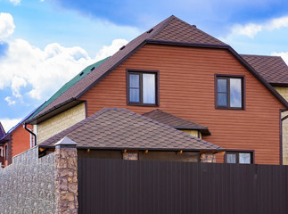 house with a gable roof window