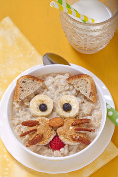 Funny oatmeal with cat face decoration