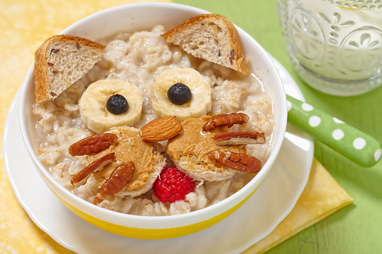 Funny oatmeal with cat face decoration