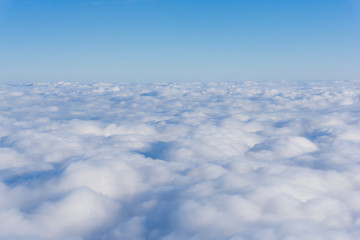 Fototapeta na wymiar Clouds. view from the window of an airplane. cloudscape scenery