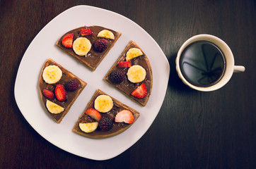 Fototapeta na wymiar Breakfast with fruits and pancakes