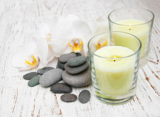 Fototapeta na wymiar White orchids with massage stones