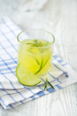 lime lemonade on wooden background
