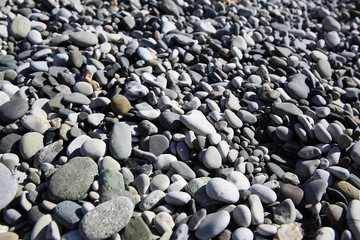 Beach round pebbles texture