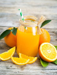 Fototapeta na wymiar Orange juice in the jar