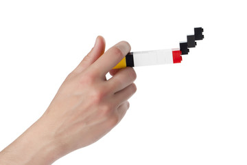 human holding cigarette made of blocks