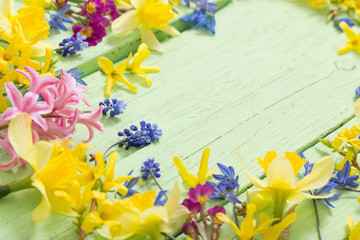 flowers on green wooden background