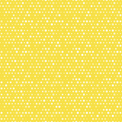 Light yellow and white dotted seamless pattern.
