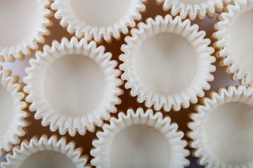 White paper forms for chocolates or cupcakes