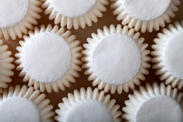 White paper forms for chocolates or cupcakes