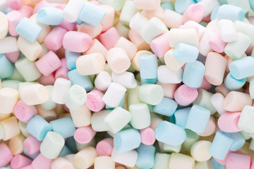 Background or texture of colorful mini marshmallows.