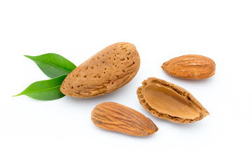 Almonds with leaves isolated on white background