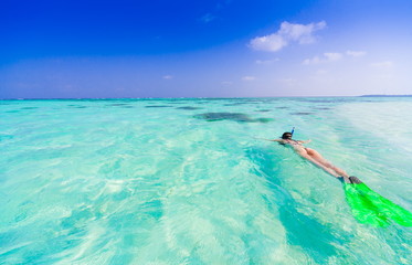 Maldives,  woman snorkeling!