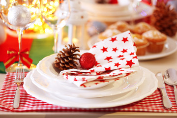 Christmas table setting with holiday decorations