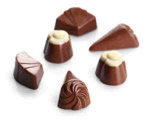 Obraz na płótnie Canvas Assorted chocolate candies, isolated on white
