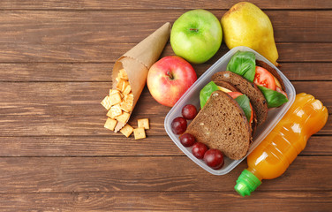 Kid school lunch on wooden background