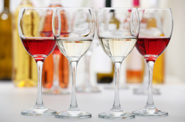 Wine glasses with red and white wine, closeup