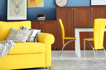 Design interior of living room in yellow colors