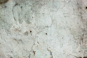 Whitewashed wall with rich and various texture