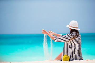 Young beautiful woman on beach vacation