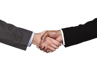 cropped image of business people shaking hands.