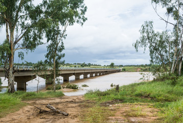 Bridge over river with high water