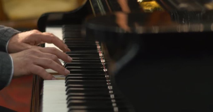 Man Plays Gently Piano
