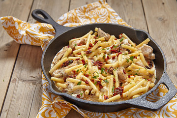 Penne pasta with chicken and cream sauce