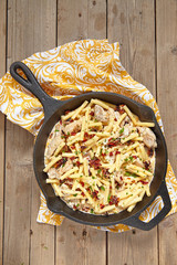 Penne pasta with chicken and cream sauce