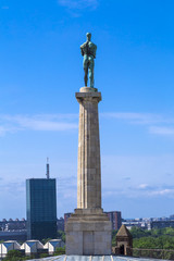 Fototapeta na wymiar Monument sculpture of the Belgrade Winner made of bronze, located in Kalemegdan, Belgrade, Serbia
