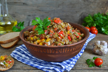 Salad of roasted vegetables on the grill with garlic and pickled