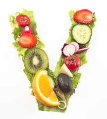 Letter V made of salad and fruits
