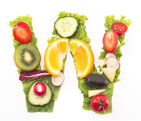 Letter W made of salad and fruits