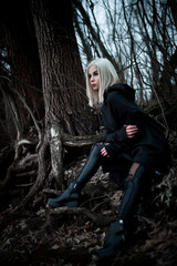 Fototapeta na wymiar Shot of a gothic woman in a forest.
