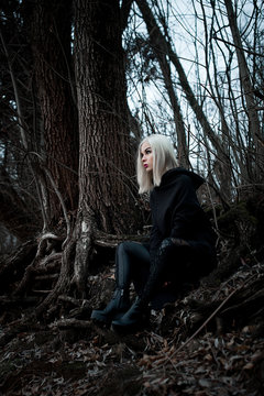 Shot of a gothic woman in a forest.
