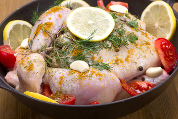 Broiler chicken in a frying pan