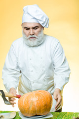 Cook with axe and pumpkin