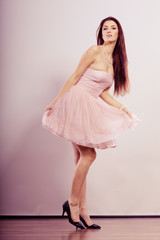 Fototapeta premium woman in bright dress and high heels shoes