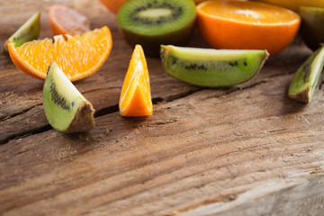 Fruit slices on wooden background