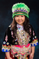 Portrait of Hmong Woman in Traditional Outfit 
